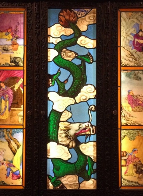 Stained glass panels from a cabinet produced for export on display at the T’ou-Se-We Museum